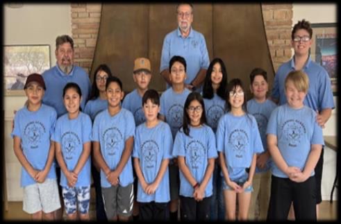 Learning Academy students and staff posed together, 2023