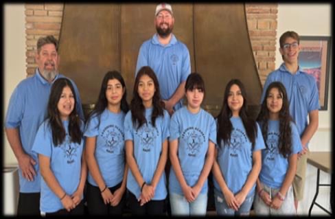 Learning Academy older students and staff posed together, summer 2023